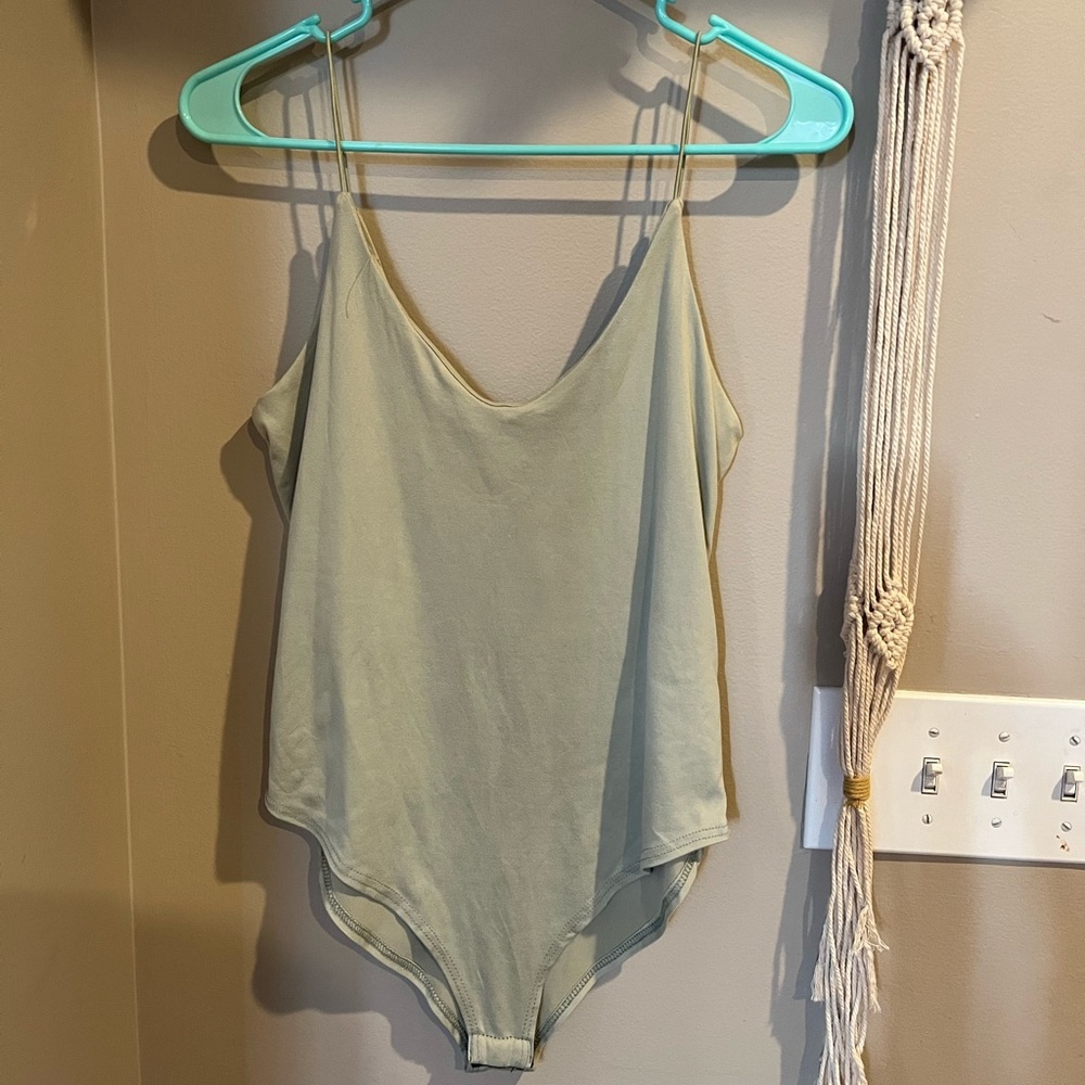 Green bodysuit